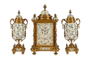 A FRENCH GILT BRASS AND PORCELAIN MANTEL CLOCK GARNITURE