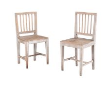 A PAIR OF SCANDINAVIAN WHITE PAINTED SINGLE CHAIRS