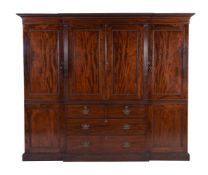 A MAHOGANY BREAKFRONT WARDROBE OR COMPACTUM, IN GEORGE III STYLE, LATE 19TH CENTURY