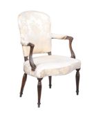 A GEORGE III MAHOGANY AND UPHOLSTERED ARMCHAIR IN FRENCH TASTE