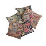 A GROUP OF FIVE CUSHIONS WITH MACHINE VERDURE TAPESTRY STYLE FACINGS