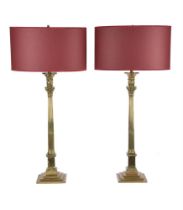 A PAIR OF BRASS TABLE LAMPS