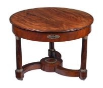 A FRENCH EMPIRE MAHOGANY AND GILT METAL MOUNTED GUERIDON OR CENTRE TABLE