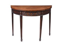 A MAHOGANY CARD TABLE IN GEORGE III STYLE