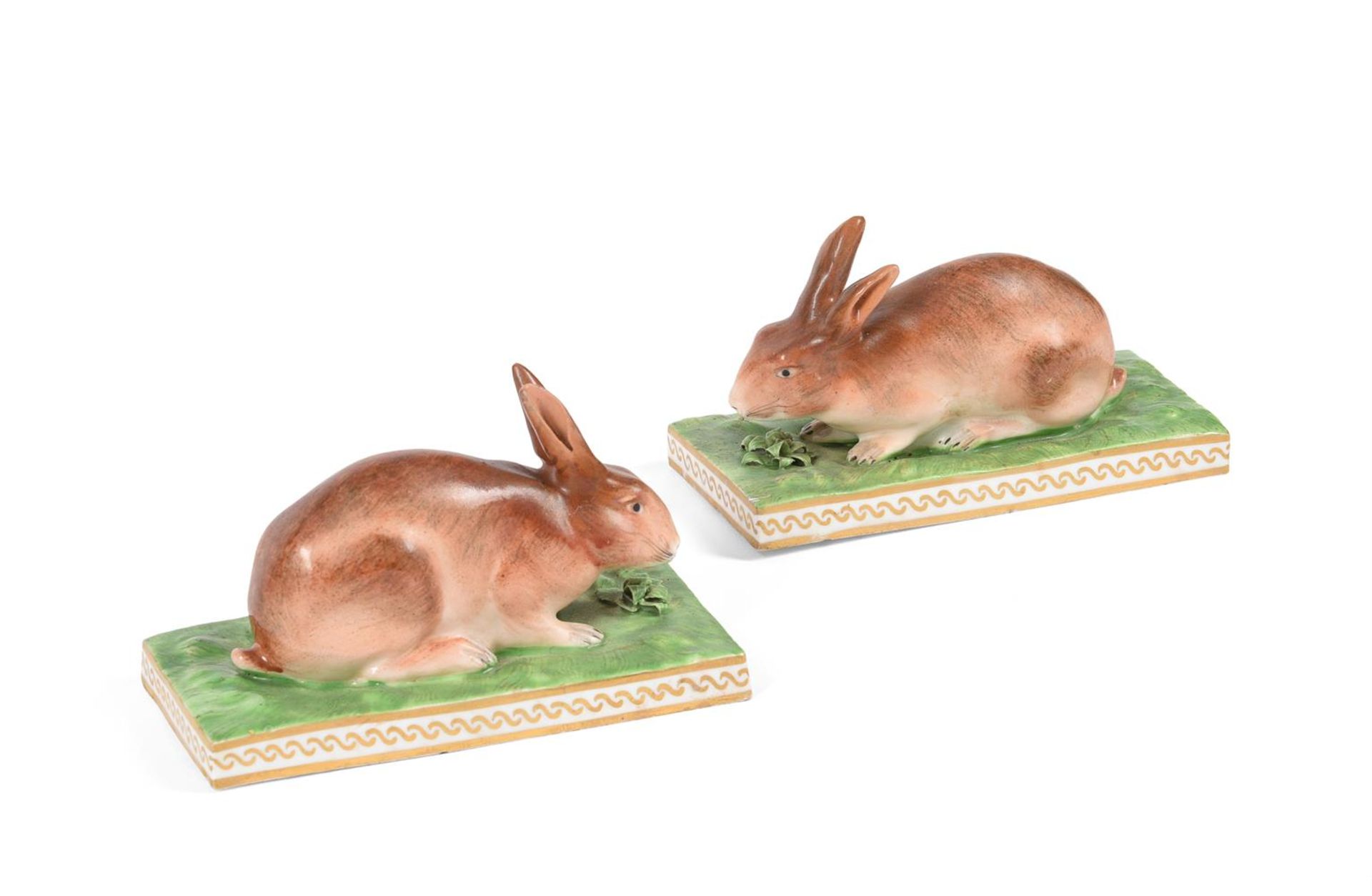 A PAIR OF DERBY MODELS OF RABBITS