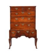 A GEORGE II FRUITWOOD CHEST ON STAND