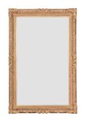 A GILTWOOD AND GESSO WALL MIRROR
