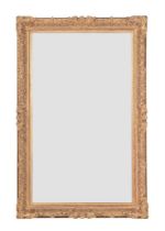 A GILTWOOD AND GESSO WALL MIRROR