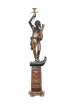 A VENETIAN EBONISED AND POLYCHROME PAINTED BLACKAMOOR TORCHERE