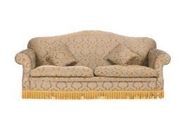 AN UPHOLSTERED SOFA IN VICTORIAN STYLE