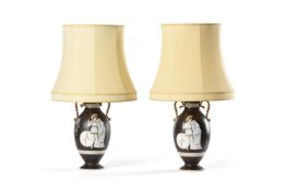 A PAIR OF PORCELAIN TABLE LAMPS DECORATED IN THE CLASSICAL TASTE