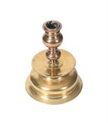 A BRASS AND COPPER CANDLESTICK