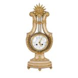 A FRENCH ALABASTER AND GILT METAL MOUNTED MANTEL CLOCK