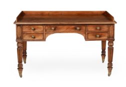 A GEORGE IV MAHOGANY DRESSING OR WRITING TABLE