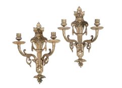 A PAIR OF GILT METAL WALL LIGHTS IN FRENCH TASTE