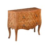 A MILANESE WALNUT AND OLIVEWOOD COMMODE