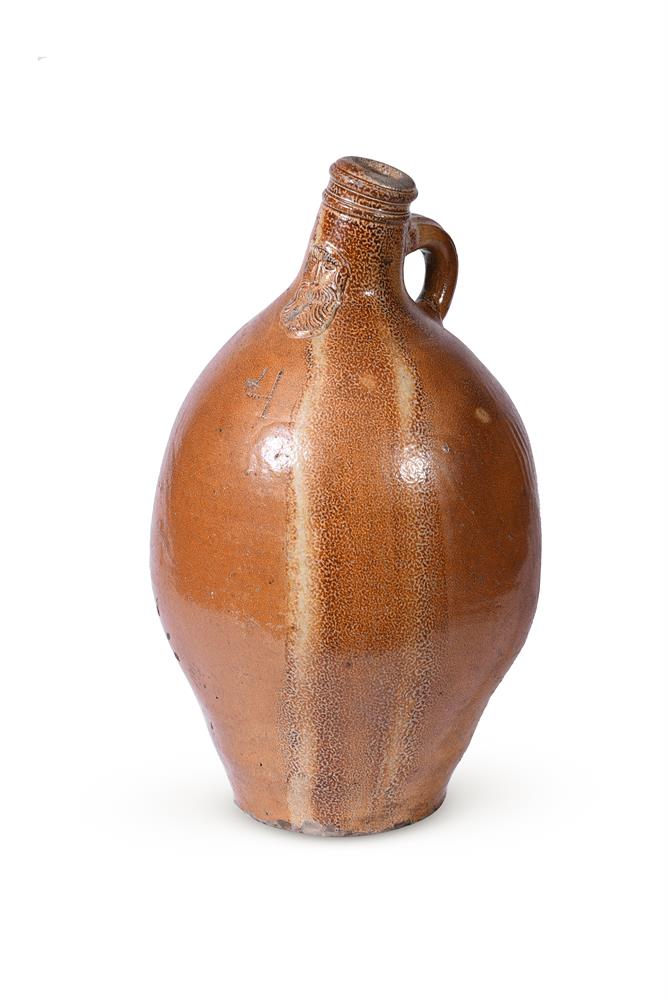 A GERMAN BELLARMINE STONEWARE JUG, 16TH/17TH CENTURY