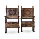 A PAIR OF ITALIAN WALNUT AND GILT TOOLED LEATHER ARMCHAIRS, 18TH CENTURY