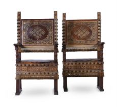 A PAIR OF ITALIAN WALNUT AND GILT TOOLED LEATHER ARMCHAIRS, 18TH CENTURY