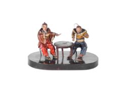 AN ANGLO-CHINESE WAX AND WOOD MODEL OF TWO MEN PLAYING CARDS, 19TH CENTURY