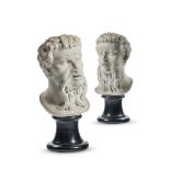 A PAIR OF WHITE MARBLE HEADS OF SATYRS ITALIAN, 17TH CENTURY