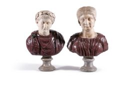 A NEAR PAIR OF ITALIAN WHITE MARBLE AND PORPHYRY BUSTS OF ANCIENT ROMANS, 17TH CENTURY OR EARLIER