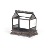 AN ENGLISH JAPANNED TIN TERRARIUM, CIRCA 1860/70