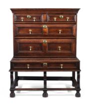 A WILLIAM III OAK CHEST ON STAND, CIRCA 1700