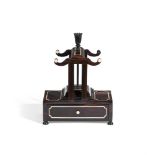 Y AN ANGLO-INDIAN EBONY AND BONE LETTER PRESS, MID 19TH CENTURY
