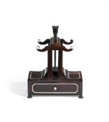 Y AN ANGLO-INDIAN EBONY AND BONE LETTER PRESS, MID 19TH CENTURY