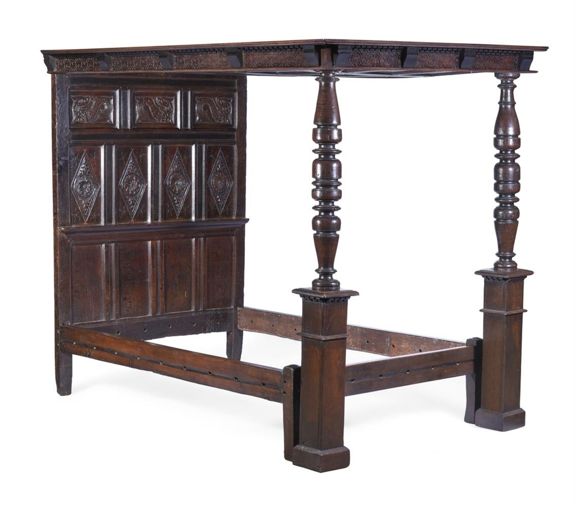 A CARVED OAK FOUR POST BED, 17TH CENTURY