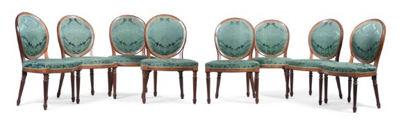 A SET OF EIGHT GEORGE III CHAIRS IN THE MANNER OF JOHN LINNELL, CIRCA 1780