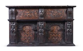 A CHARLES II CARVED OAK AND MARQUETRY OVERMANTLE OR WALL PANEL OF YORKSHIRE TYPE, CIRCA 1660
