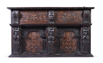 A CHARLES II CARVED OAK AND MARQUETRY OVERMANTLE OR WALL PANEL OF YORKSHIRE TYPE, CIRCA 1660