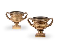AFTER THE ANTIQUE, A PAIR OF REGENCY ORMOLU WARWICK VASES, EARLY 19TH CENTURY