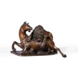 A GERMAN BRONZE GROUP OF A LION ATTACKING A HORSE, 17TH CENTURY