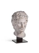 A MARBLE HEAD OF A BACCHANTE ROMAN, 2ND/3RD CENTURY A.D, AND POSSIBLY WITH SOME RECARVING