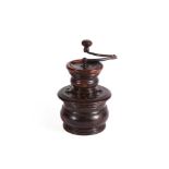 A TURNED LIGNUM VITAE COFFEE GRINDER, 18TH/19TH CENTURY