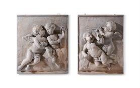 A PAIR OF PLASTER HIGH RELIEFS PANELS OF PUTTI ENGLISH