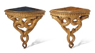 A MATCHED PAIR OF ITALIAN CARVED GILTWOOD CORNER CONSOLE TABLES, LATE 18TH CENTURY