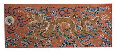 A Chinese silk Kesi red-ground 'Dragon' panel