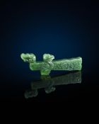 A Chinese archaistic spinach jade staff fitting