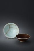 A Yaozhou persimmon-glazed bowl and a pale celadon glazed floral moulded bowl
