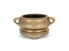 A large Chinese bronze censer and stand