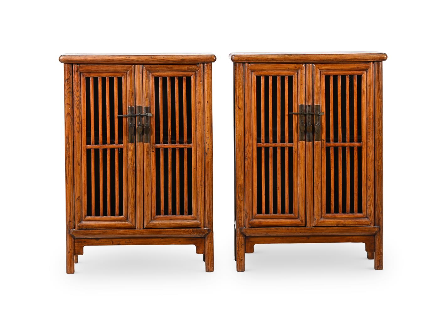 A pair of Chinese Elm cabinets