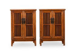 A pair of Chinese Elm cabinets