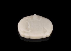 A Chinese pale celadon jade elephant box and cover