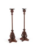 Y A large pair of Chinese hardwood stands