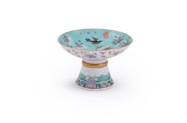 A Chinese Famille Rose turquoise-ground footed bowl