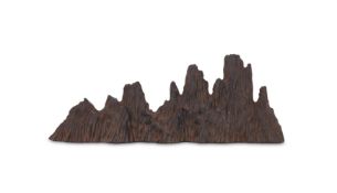 A Chinese stone carved mountain-form brush rest